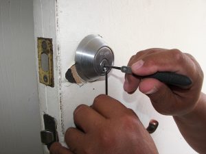 Locksmith picking a lock